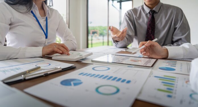 Business team employee adviser meeting to analysis and discuss the situation on the financial report in the meeting room. Investment Consultant, Financial advisor and accounting concept